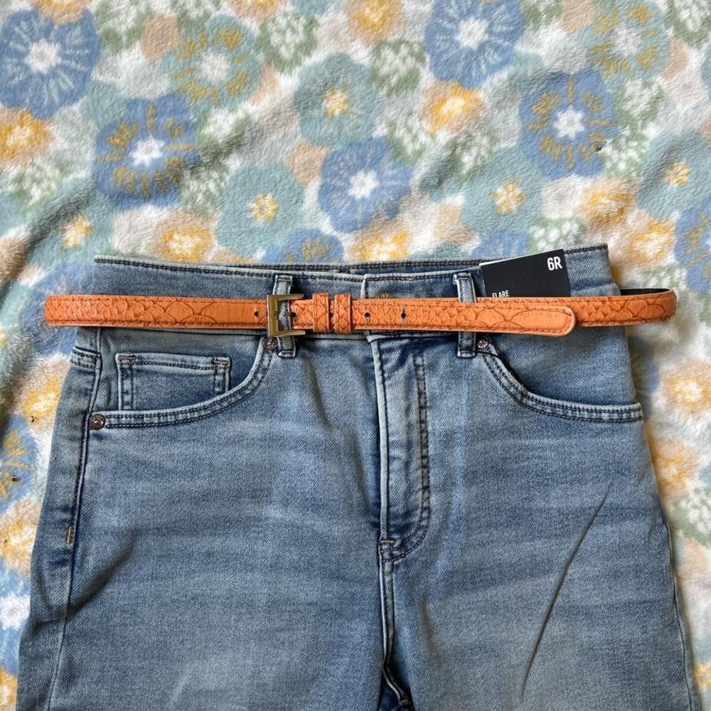 orange and silver faux snake leather belt - material is flaking on inside